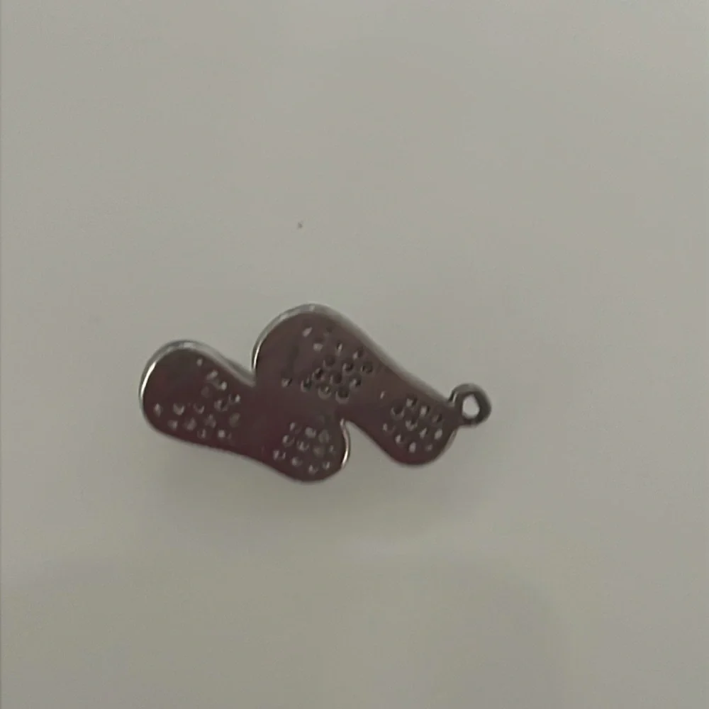 Silver flip flop charm